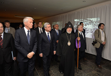 President watches genocide book and photo exhibitions held as part of global forum